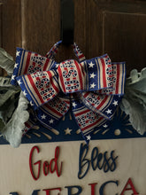Load image into Gallery viewer, God Bless America Door Hanger | 19" Patriotic Round Sign | Hand Painted Birch Wood | 4th of July Front Door Decor