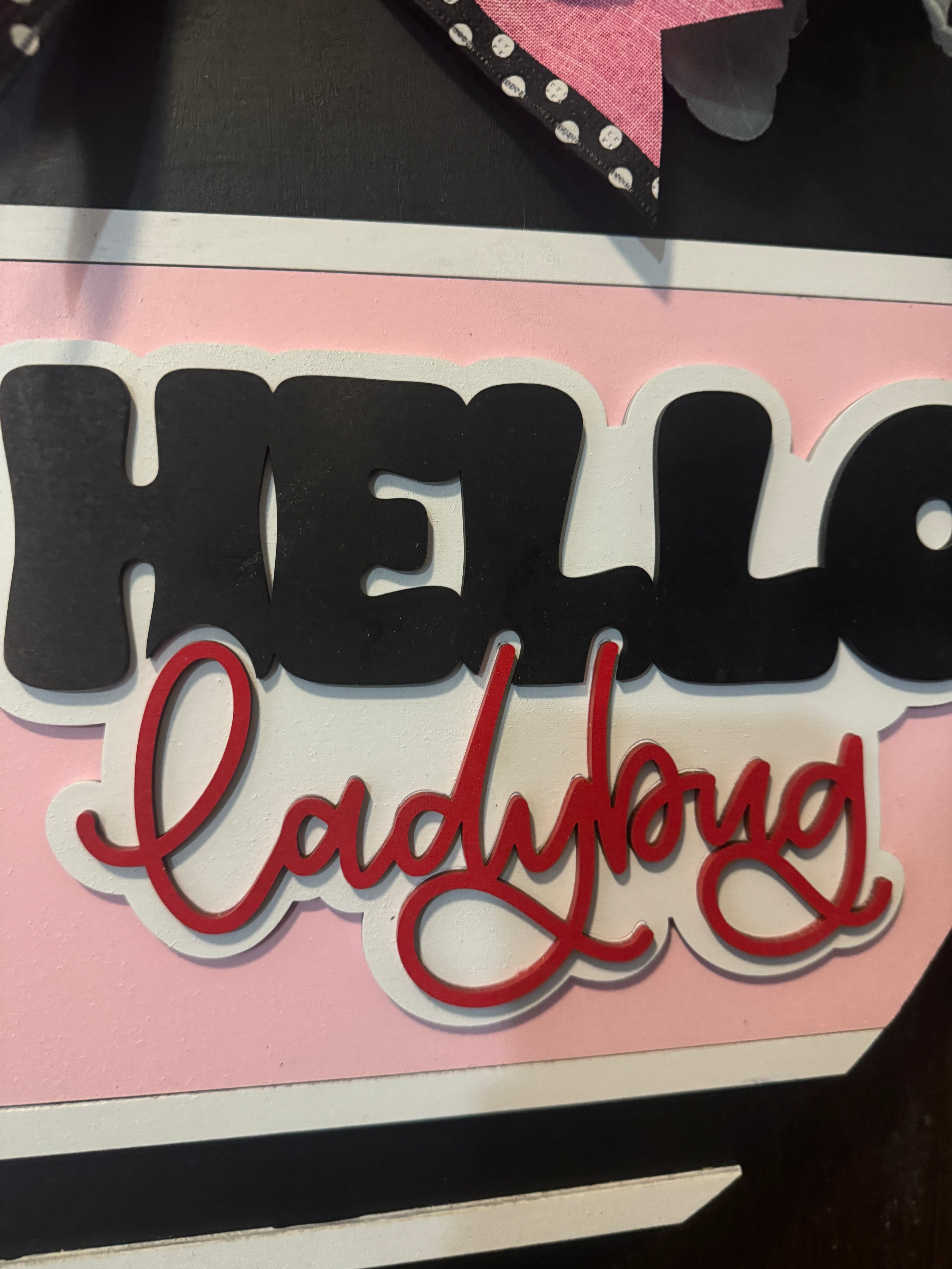 Hello Pink &amp; Black Door Hanger – Hand-Painted 18" Laser-Cut Wood Round – Front Door Decor, Year-Round Welcome Sign, Modern Entryway Accent