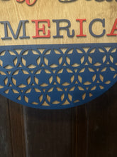 Load image into Gallery viewer, God Bless America Door Hanger | 19&quot; Patriotic Round Sign | Hand Painted Birch Wood | 4th of July Front Door Decor
