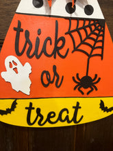 Load image into Gallery viewer, Trick or Treat Candy Corn Door Hanger | Wooden Halloween Sign | Hand Painted &amp; Laser Cut | Ghost, Spider &amp; Bat Décor

