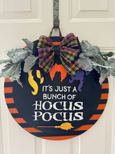 Load image into Gallery viewer, "Hocus Pocus" Halloween Door Hanger | Witch Hair Wood Sign with Plaid Bow | Orange &amp; Black Striped Round Sign | Fall Front Door Decor
