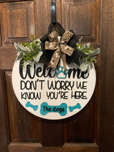 Load image into Gallery viewer, Welcome We Know You&#39;re Here the Dogs Door Hanger
