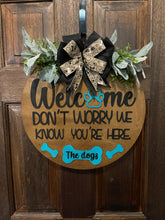 Load image into Gallery viewer, Welcome We Know You&#39;re Here The Dogs Door Hanger
