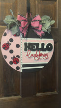 Load and play video in Gallery viewer, Hello Pink &amp; Black Door Hanger – Hand-Painted 18&quot; Laser-Cut Wood Round – Front Door Decor, Year-Round Welcome Sign, Modern Entryway Accent
