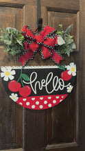 Load and play video in Gallery viewer, Hello Door Hanger | Red &amp; Black Cherry Wood Round | Front Door Sign | Handcrafted Welcome Sign | Year-Round Porch Decor

